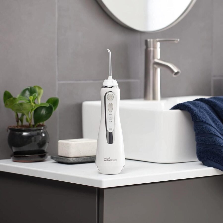 Ирригатор Waterpik WP-560ЕU портатив. импульсн. 4насад. белый — изображение 4